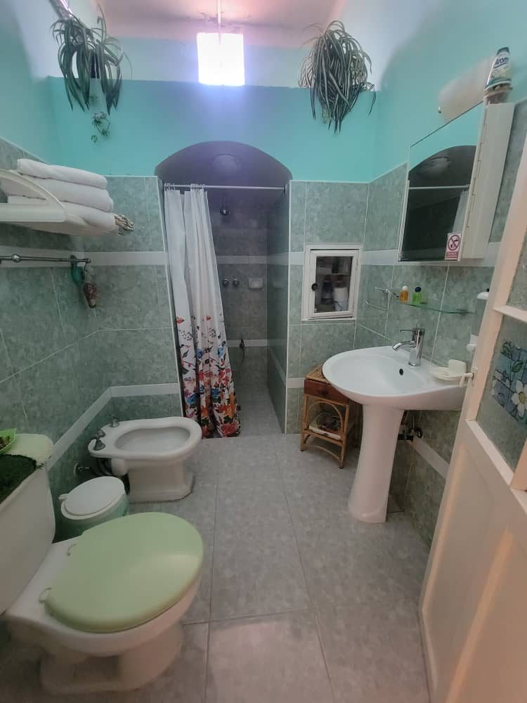 Private bathroom with shower, bidet and fresh towels