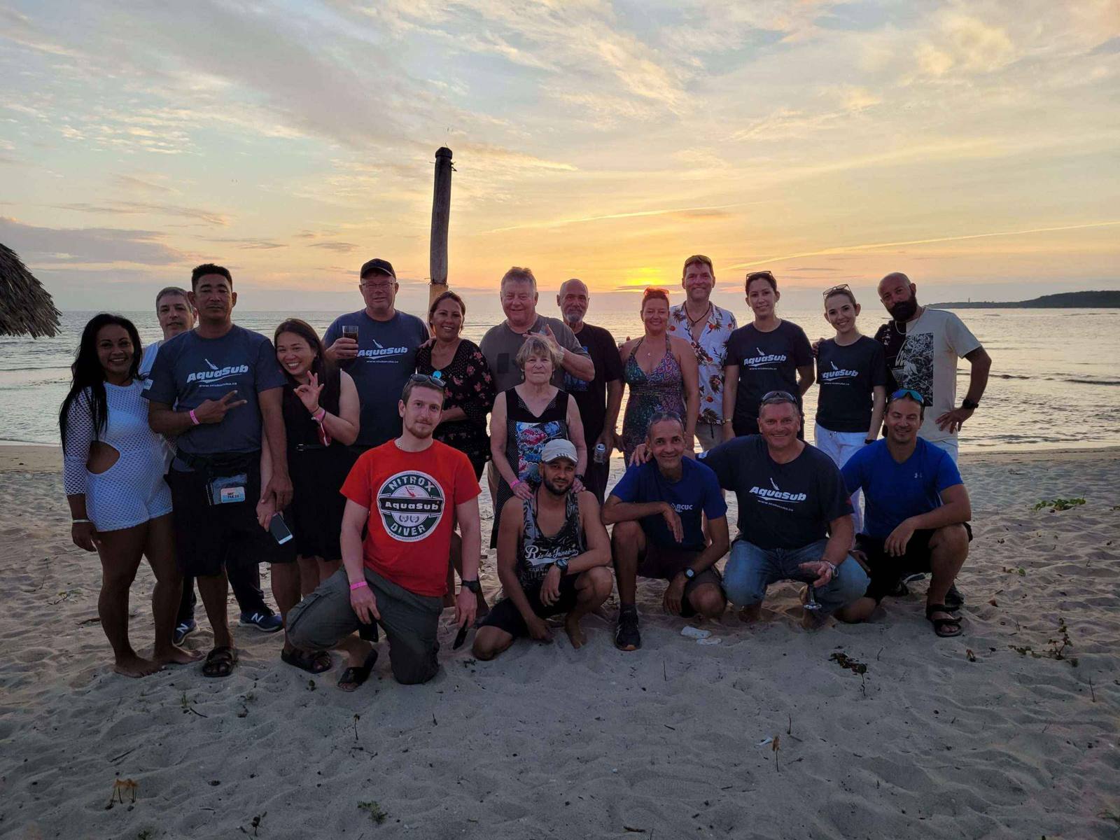 ScubaCuba group photo at sunset on Cuban beach