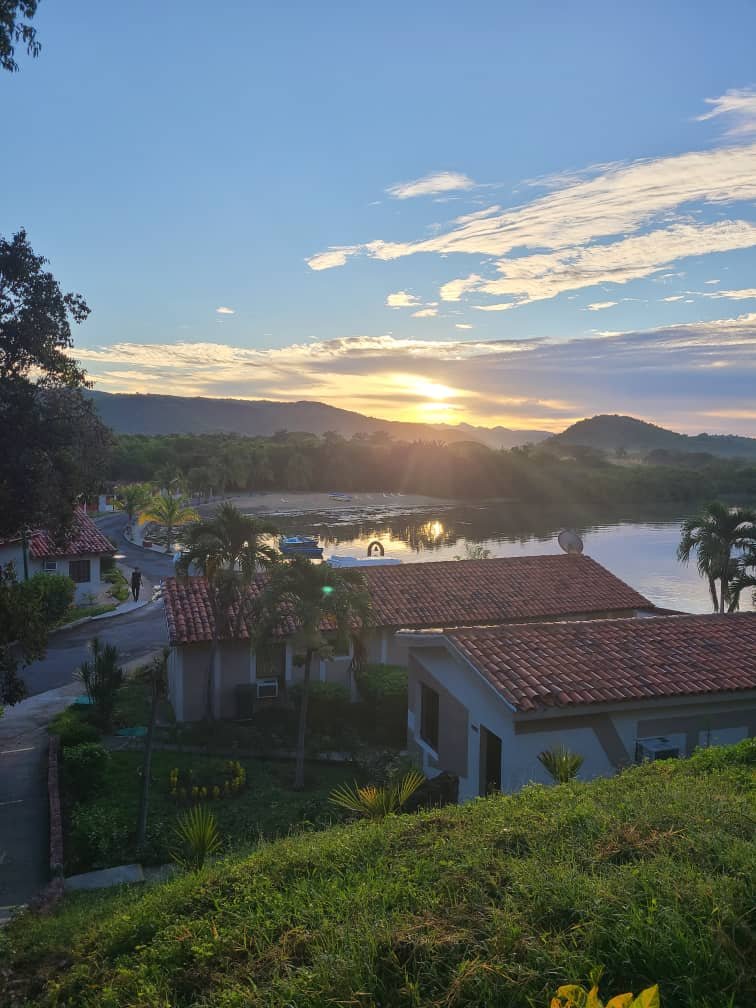 Eco-lodge cabins at Guajimico at sunset